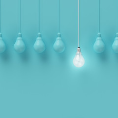 Hanging light bulbs with glowing one different idea on light blue background , Minimal concept idea , flat lay , top - obrazy, fototapety, plakaty