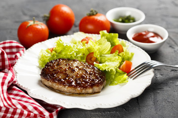 Beef burger with tomato sauce