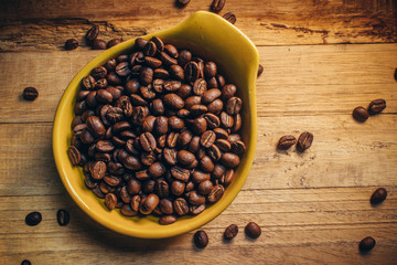  Coffee bean on wooden background
