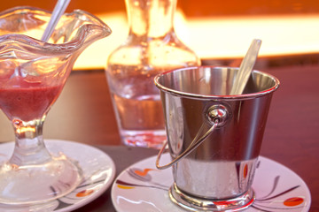 icecream with a bucket of ice an a jug of water