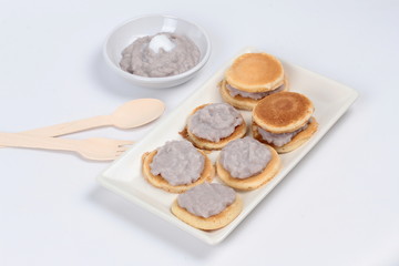 Mini pancake topped stirred taro.