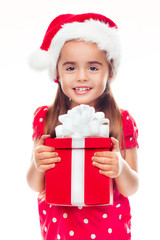 Holidays, baby girl make a present, christmas, birthday, new year, x-mas concept - happy child girl with gift boxes, toned