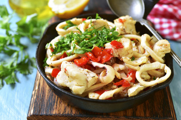 Seafood ragout with vegetables and herbs.