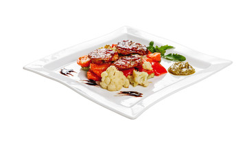 Grilled vegetables with meat and sauce