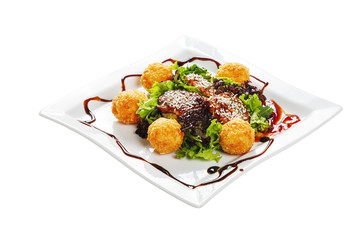 Fresh salad with pork and balsamic sauce