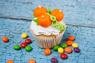 Halloween cupcake with colored decorations