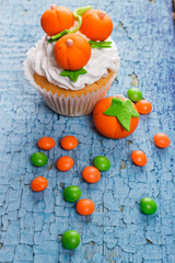 Halloween cupcake with colored decorations