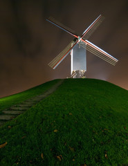 Cornmill in Bruges by night in Bruges, Belgium