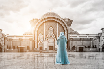 Wilayah persekutuan mosque with Islamic Malaysian muslim pray 