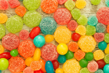 Fototapeta na wymiar Colorful jelly beans to wallpaper