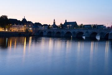 Maastricht across the river during sunset