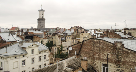 Fototapeta na wymiar view from the roof of the house to the town hall, Lviv, Ukraine 