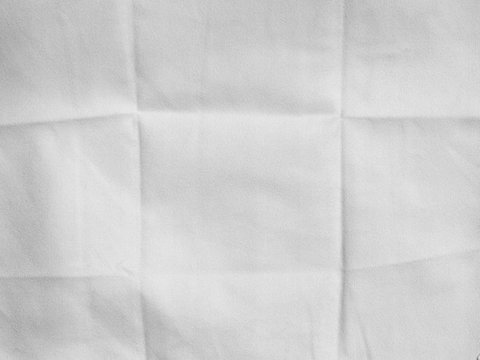 Crumpled white fabric texture, cloth background