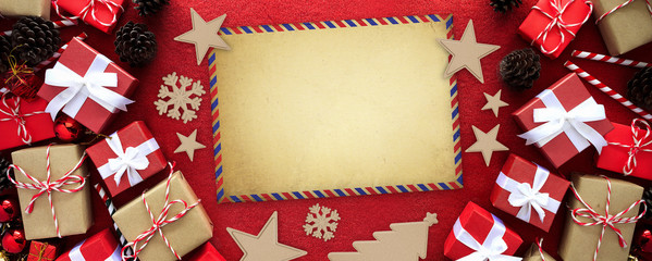 Fototapeta premium merry christmas gift box with white ribbon on red velvet background. over light 0