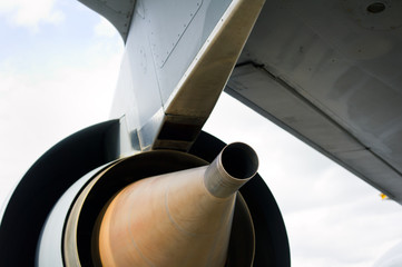 Detail of jet airplane - backside of turbine engine of plane.