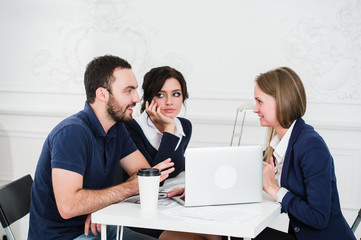 Fototapeta premium Young couple meeting architect for future house