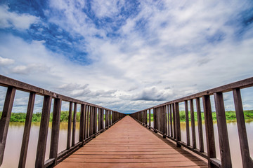 Fototapeta na wymiar wooden bridge and blue sky.