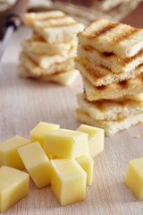 Cheese and honey appetizer, on a chopping board