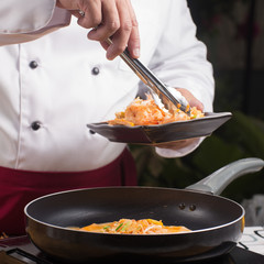 Chef cooking Pad Thai