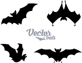 Black bats silhouettes vector set isolated on white