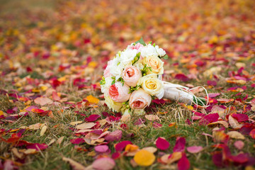 Autumn leaves around Wedding Bouquet 