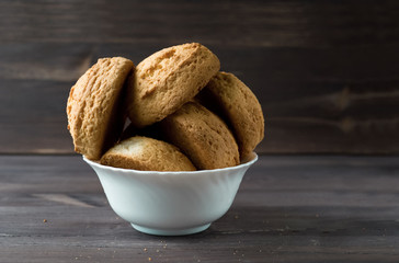 cookies in bowl dish on a wooden table