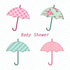 Cute vintage baby shower card with umbrella as fabric applique
