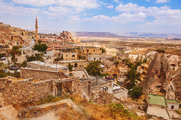Fototapeta premium Uchisar village among rocky valleys in Cappadocia area