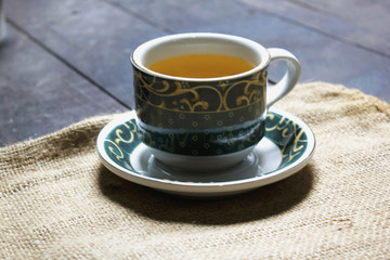 Cup of tea above the sack cloth
