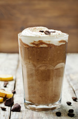 coffee chocolate banana smoothie with coconut whipped cream