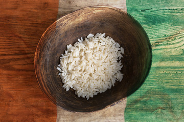 Poverty concept, bowl of rice with Ivory Coast flag