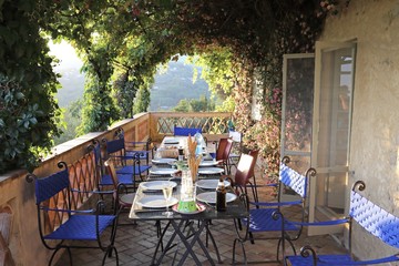 dinner on a wonderful terrace in summer at sunset