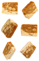 Nougat with nuts from different angles. Isolation on white backg