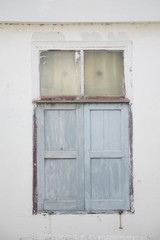 Fototapeta na wymiar wood window on cement wall