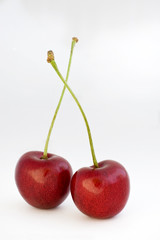 Dwie czereśnie splecione ogonkami