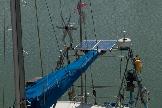 Solar charging batteries aboard, sail boat Photovoltaic panels energy concept