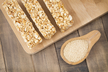 Amaranth bars in the wooden background