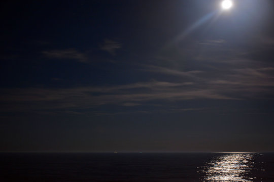 Glowing Moon above the Ocean