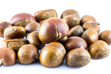 Fresh chestnuts isolated on white