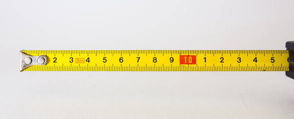 Tape Measure Rolled Out Yellow Bright Lines Closeup Construction