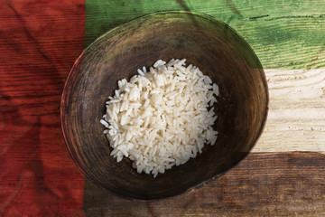 Poverty concept, bowl of rice with United Arab Emirates flag