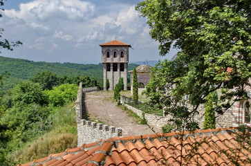 View of inner  part yard with bell tower in restored Montenegrin or Giginski monastery  St. St. Cosmas and Damian, mountain,  Kitka, Breznik, Pernik region, Bulgaria  