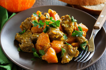 Yellow curry with pumpkin and pork.
