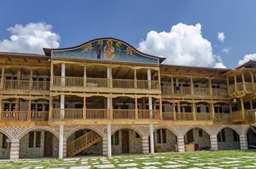 View of inner  part yard with new monastic house in restored Montenegrin or Giginski monastery  St. St. Cosmas and Damian, mountain  Kitka, Breznik, Pernik region, Bulgaria 