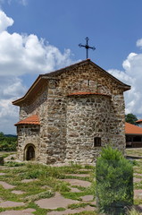 View of inner  yard with old medieval church  in restored Montenegrin or Giginski monastery  St. St. Cosmas and Damian, mountain  Kitka, Breznik, Pernik region, Bulgaria 
