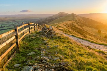 Mountain Path Bathed In Golden Sunlight In The Peak District, UK.