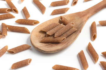 Wholemeal Pasta. Integral Penne into a spoon