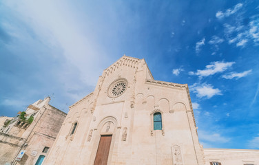 view of typical church of Matera, Cathedral of Matera under blue sky