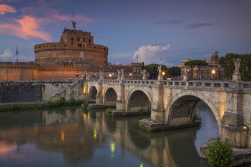 Rome. Image of the Castle of Holy Angel and Holy Angel Bridge over the Tiber River in Rome at sunset.