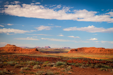 Valley of the Gods- near Mexican Hat- Utah. In center is a distant view of Monument Valley from Valley of the Gods.